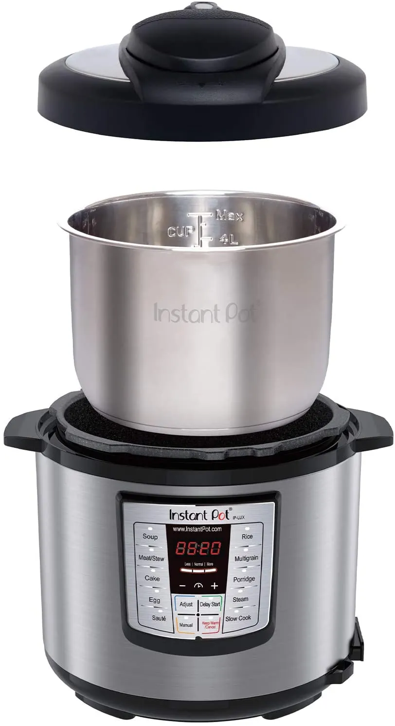 Shows light use, includes box, Manual & 14 Day Guarantee! Instant Pot® Lux 6-in-1 Multi-Use Programmable Pressure Cooker, 6 Quart | STAINLESS STEEL!